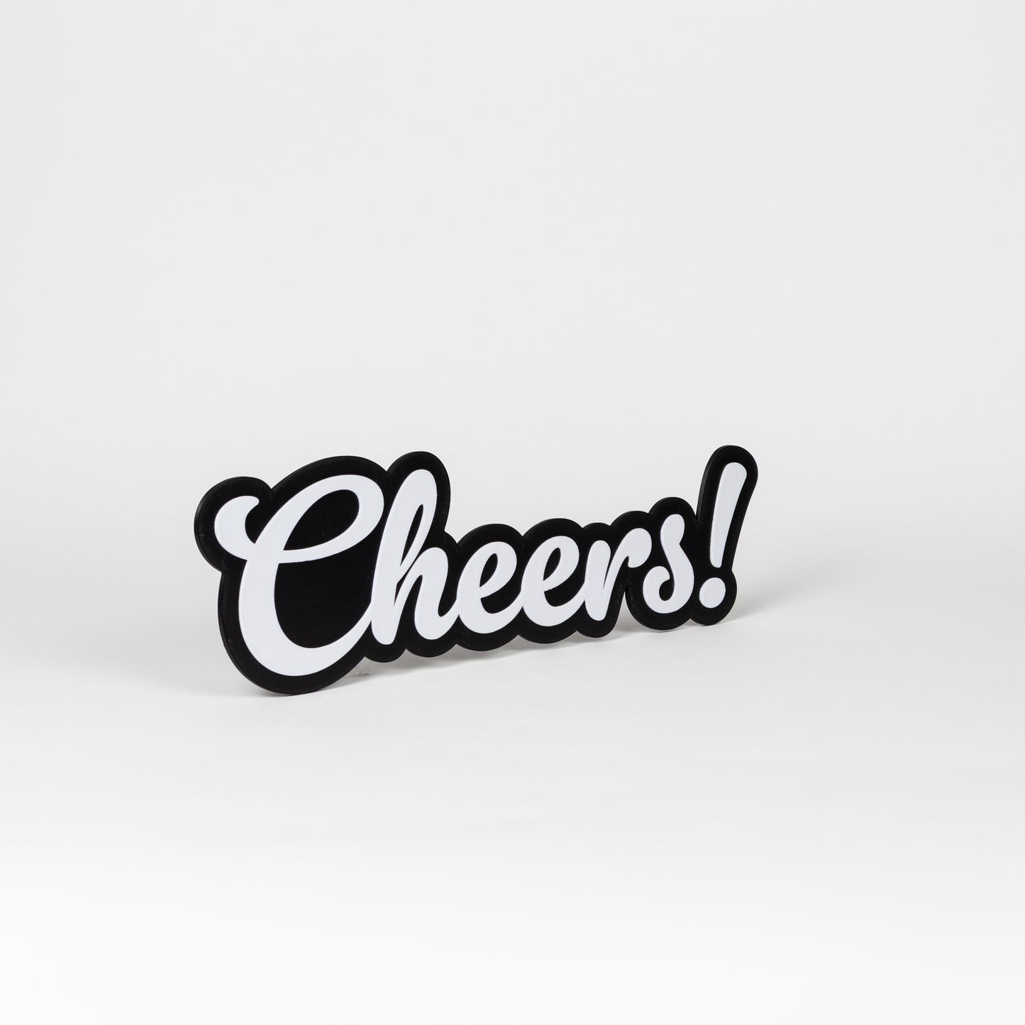 Black and white 'Cheers!' sign on a white background