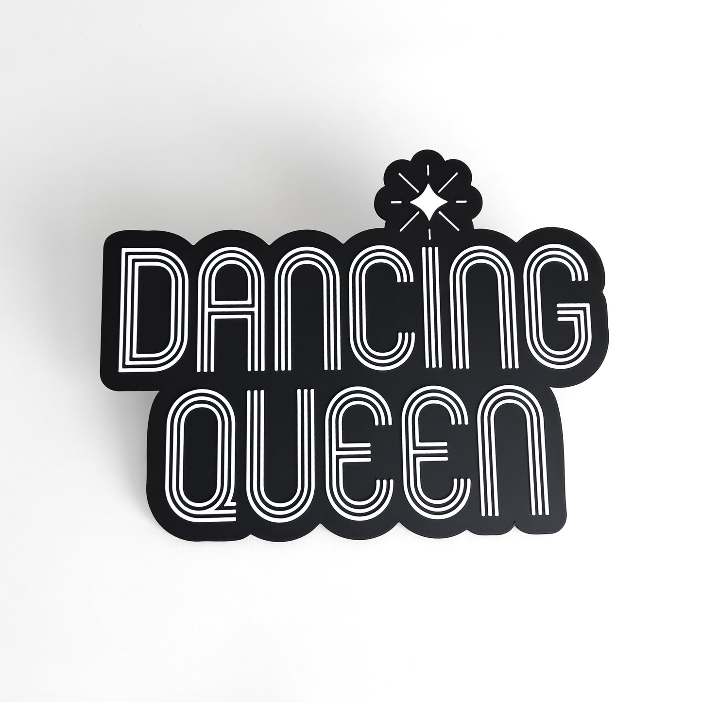 Black and white sign photo booth prop that says "Dancing Queen"