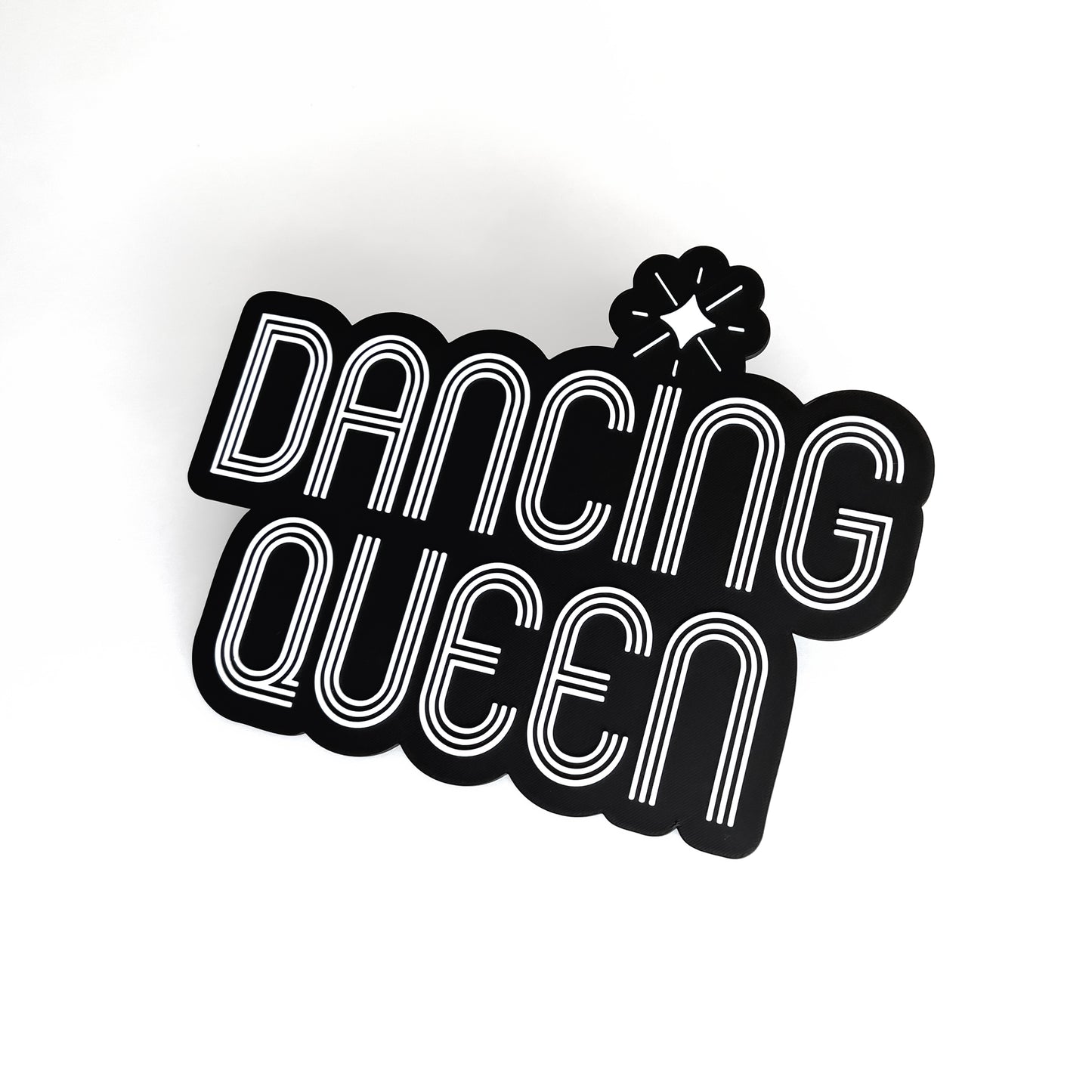 Black and white sign photo booth prop that says "Dancing Queen"