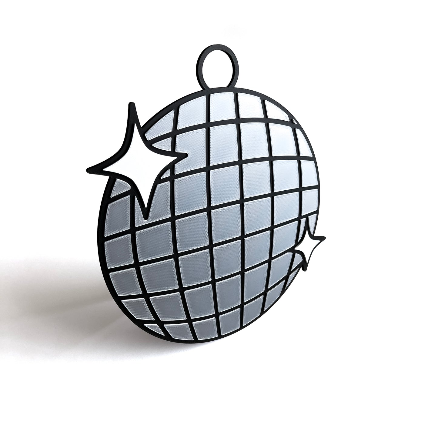 3D printed disco ball prop sign with reflective silver tiles and white sparkle accents on a white background.
