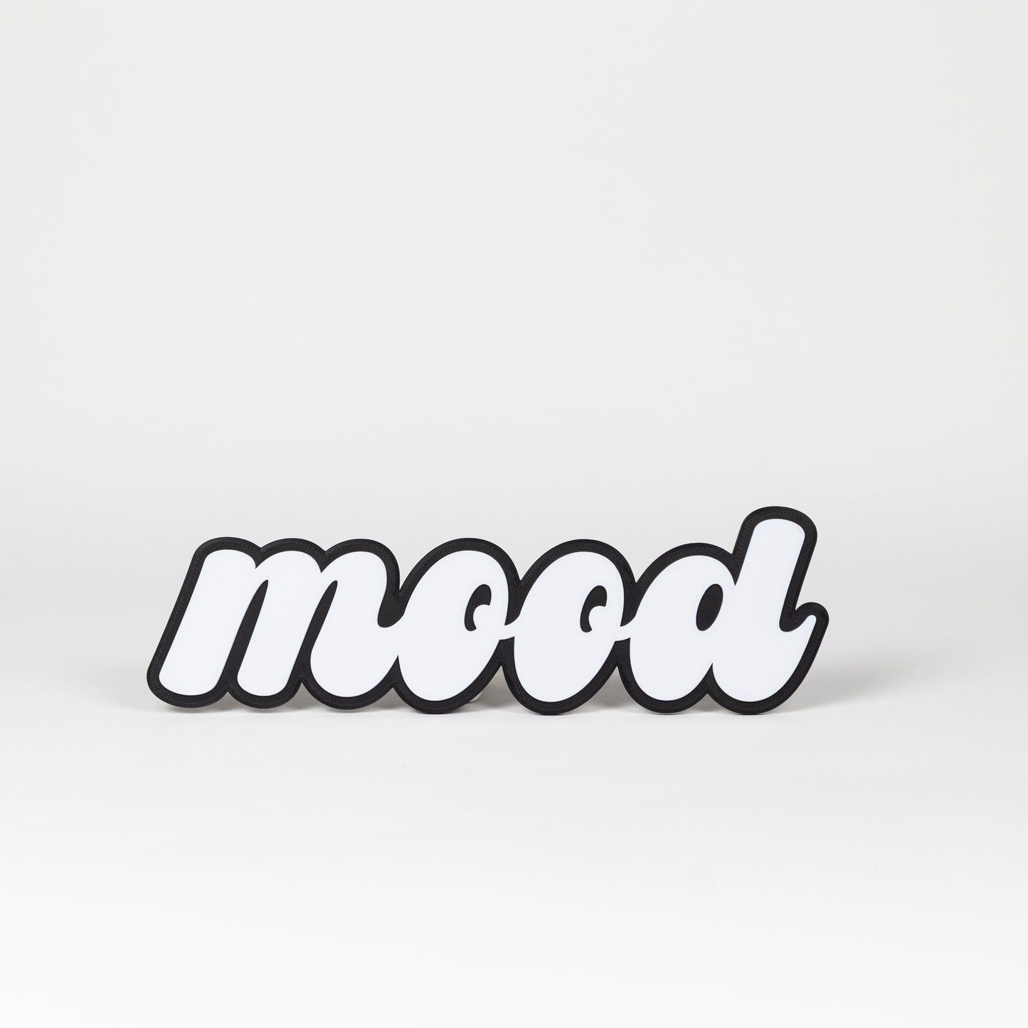 Black and white photo booth prop sign that says 'mood'. Shot on a white background