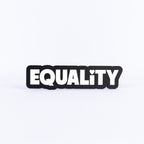 Black and white sign with the word 'EQUALITY' on a white background