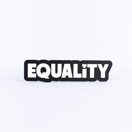 Black and white sign with the word 'EQUALITY' on a white background