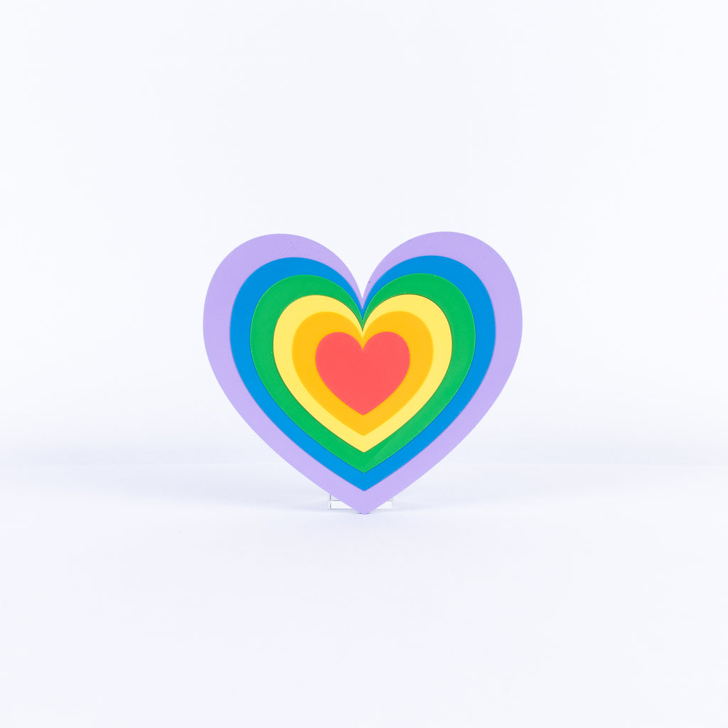 Colorful heart-shaped sign on a white background