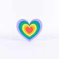 Colorful heart-shaped sign on a white background