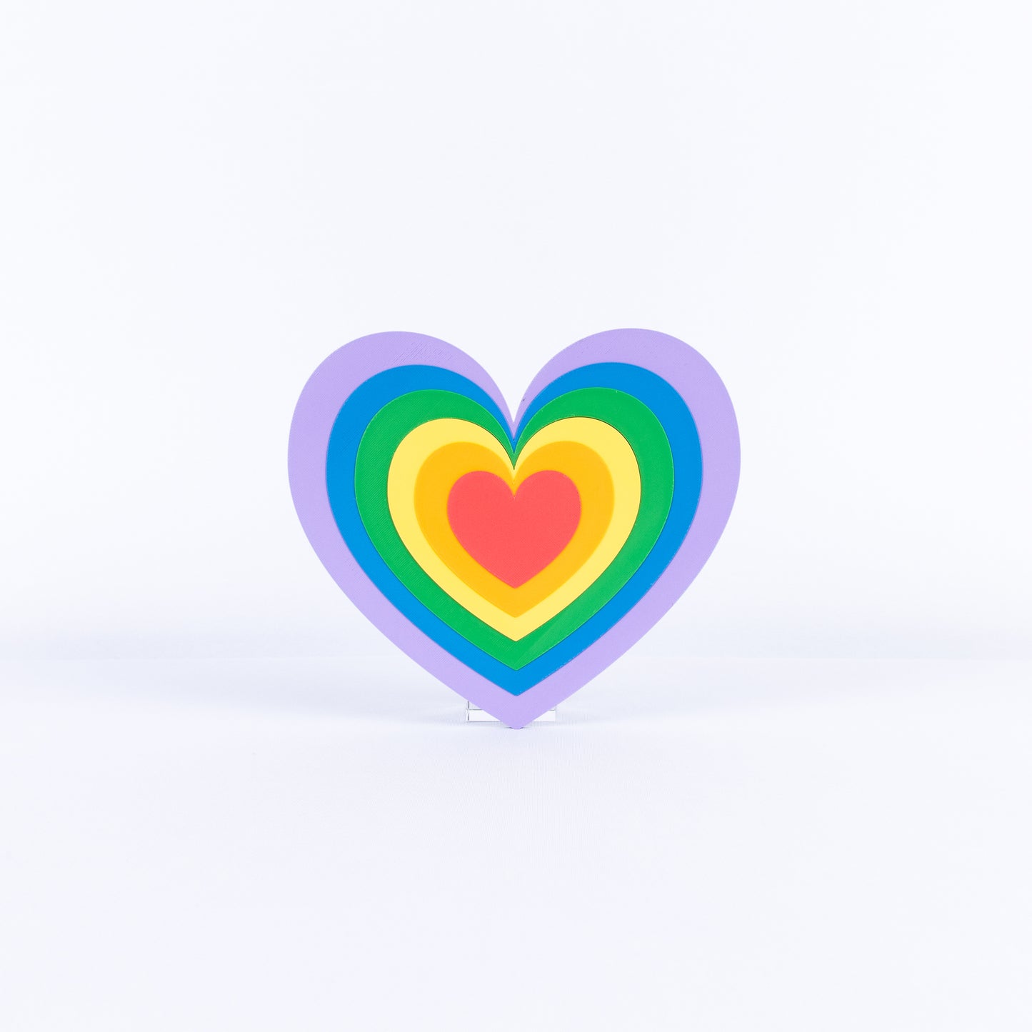 Colorful heart-shaped sign on a white background