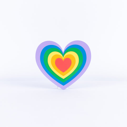 Colorful heart-shaped sign on a white background