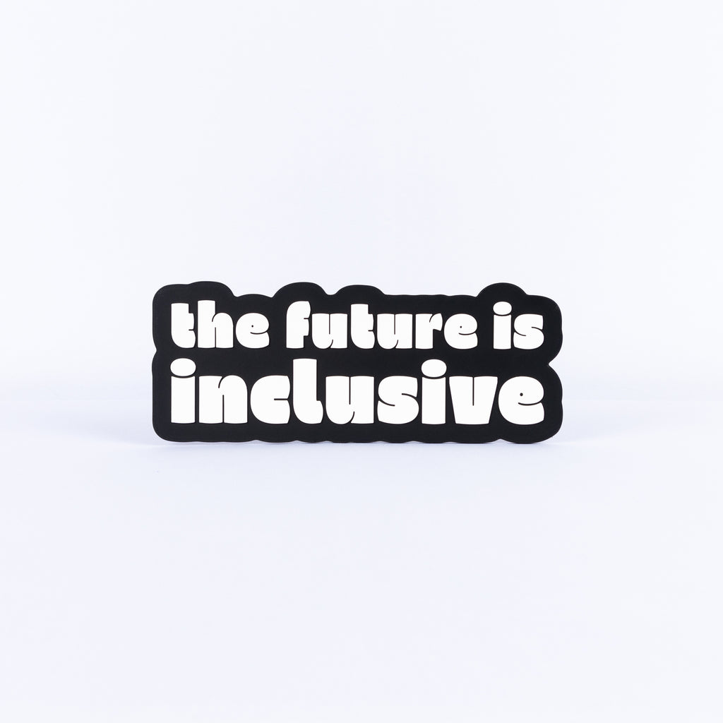 Black and white sign with 'the future is inclusive' text on a white background