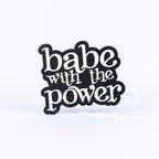 Black and white photo booth prop sign that says "babe with the power"