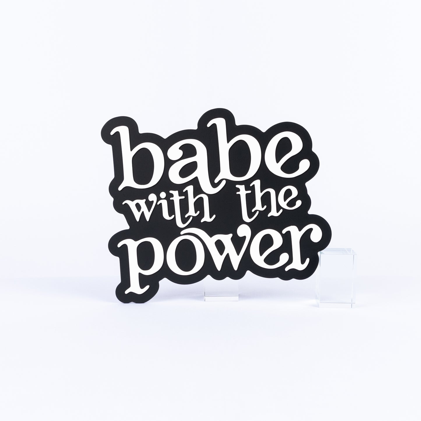 Black and white photo booth prop sign that says "babe with the power"