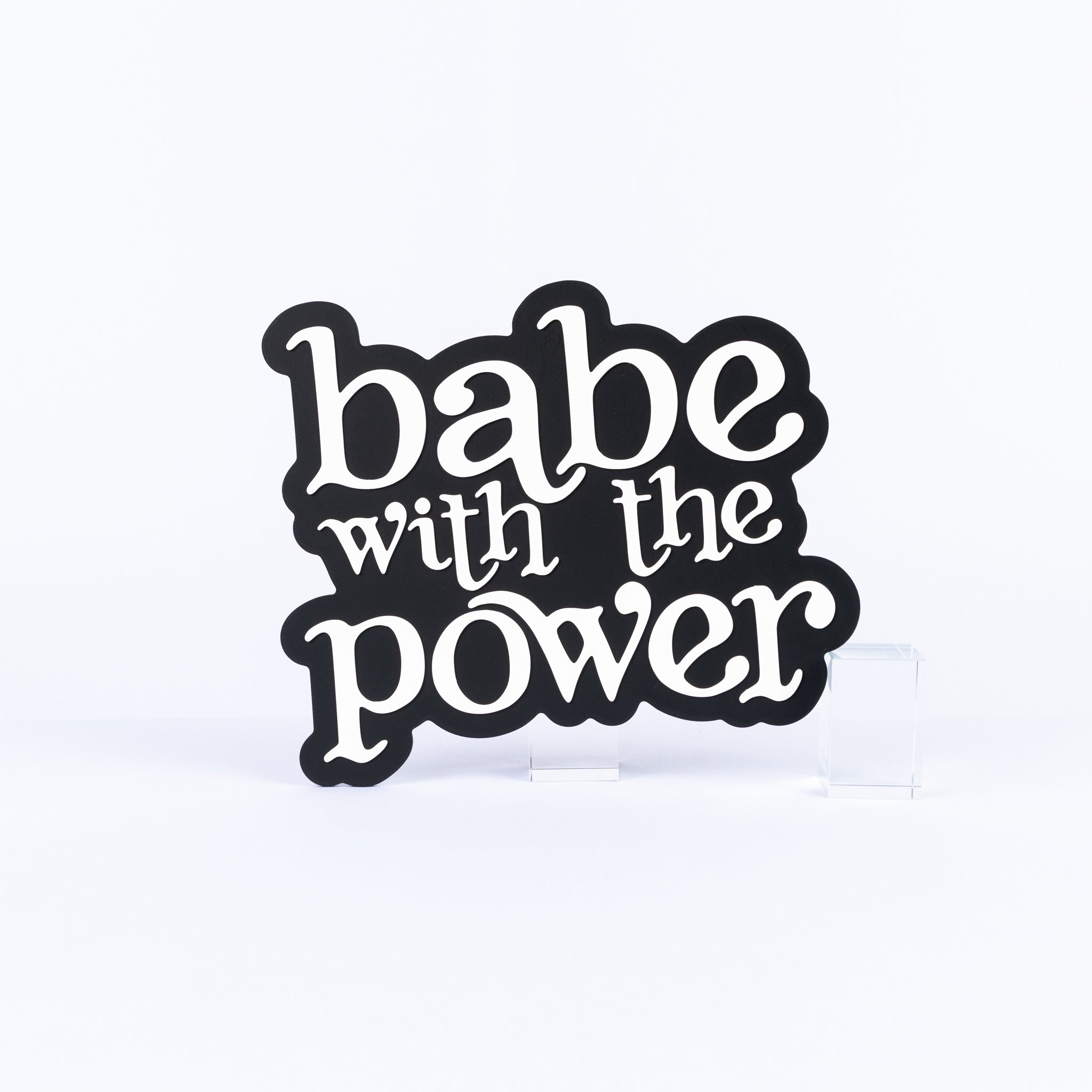 Black and white photo booth prop sign that says "babe with the power"