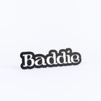 Black and white photo booth prop sign that says "baddie"