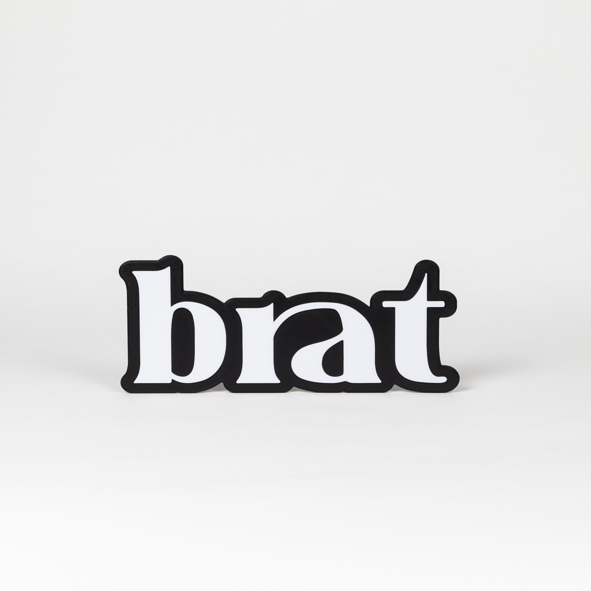 black and white brat sign photo booth prop