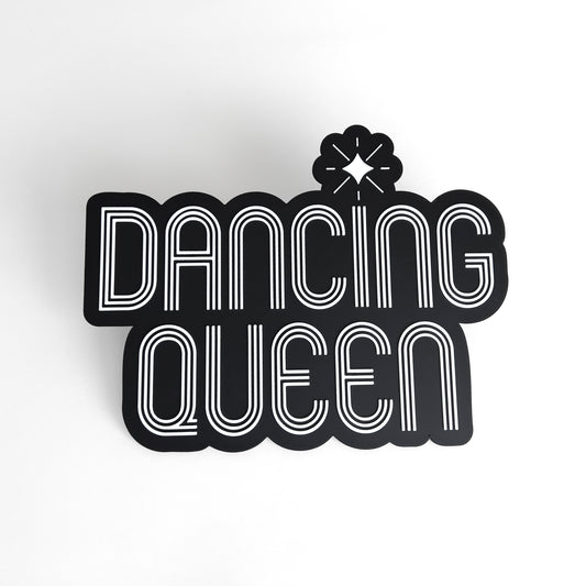 Black and white sign photo booth prop that says "Dancing Queen"