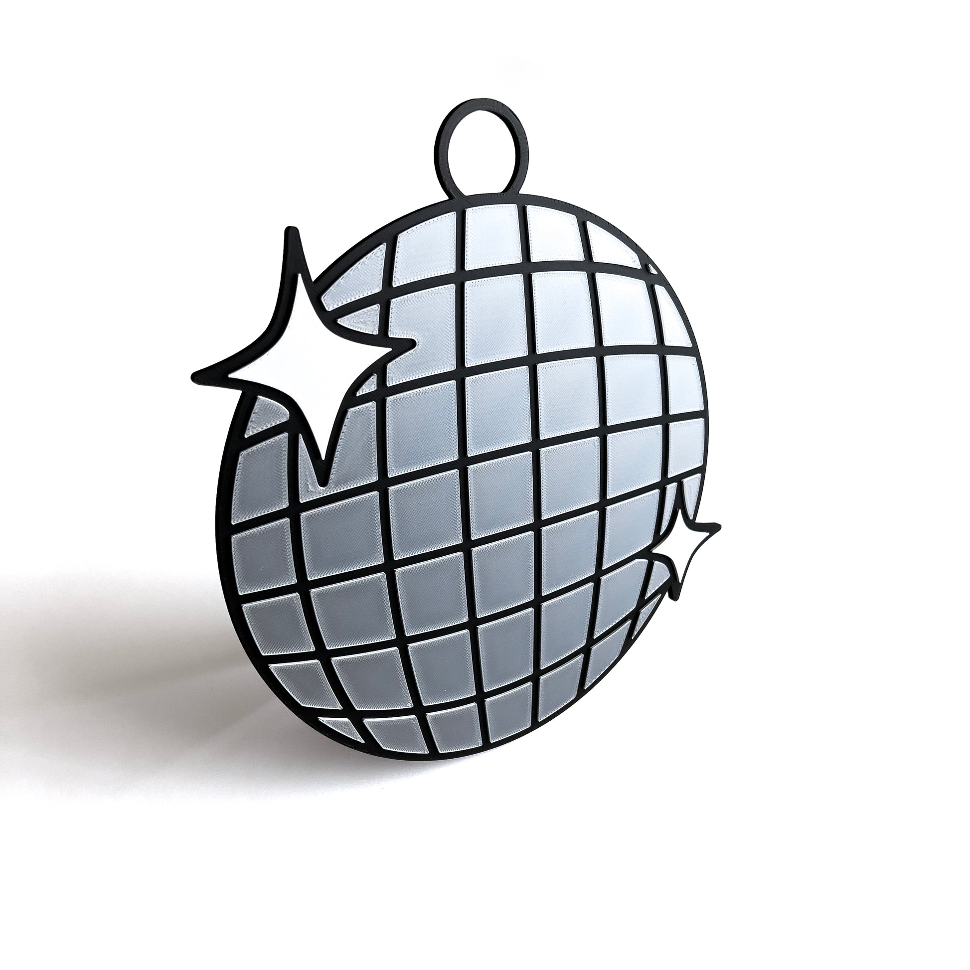 3D printed disco ball prop sign with reflective silver tiles and white sparkle accents on a white background.