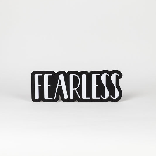 Black and white photo booth prop 'FEARLESS' sign on a white background