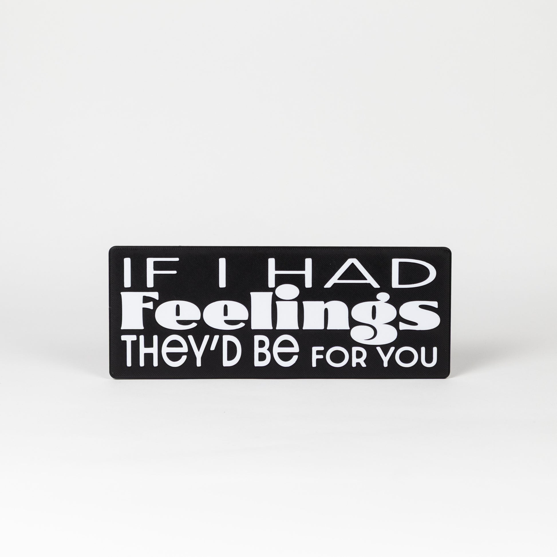 Sarcastic Photo Prop. Black sign with white text on a white background that says, "If I had feelings, they'd be for you"