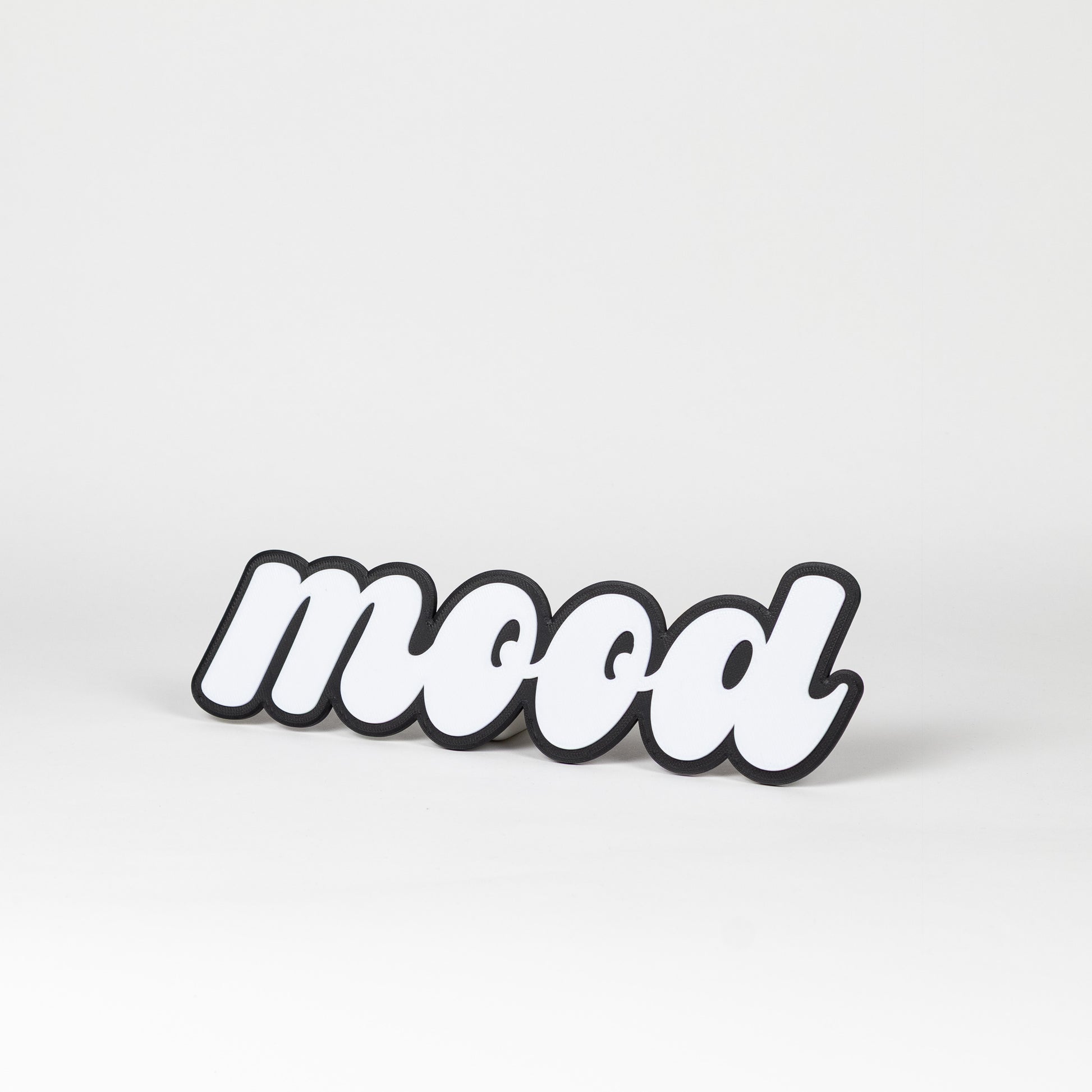 Black and white photo booth prop sign that says 'mood'. Shot on a white background
