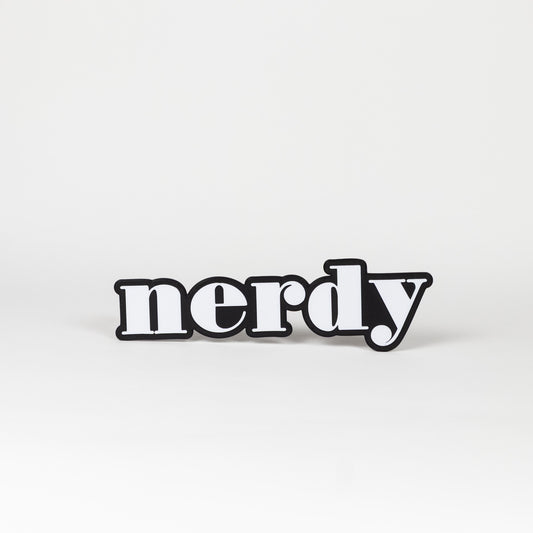 Black and white photo booth prop of the word 'nerdy'