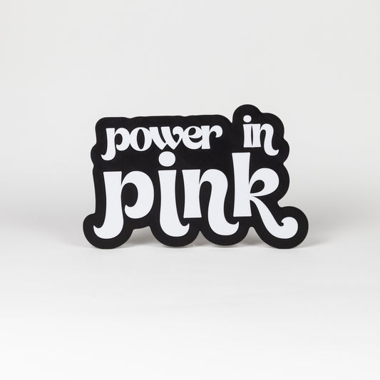 Black and white "Power In Pink" sign. Photo booth prop.