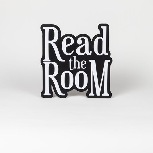 Black and white "Read the Room" sign. Photo booth prop.