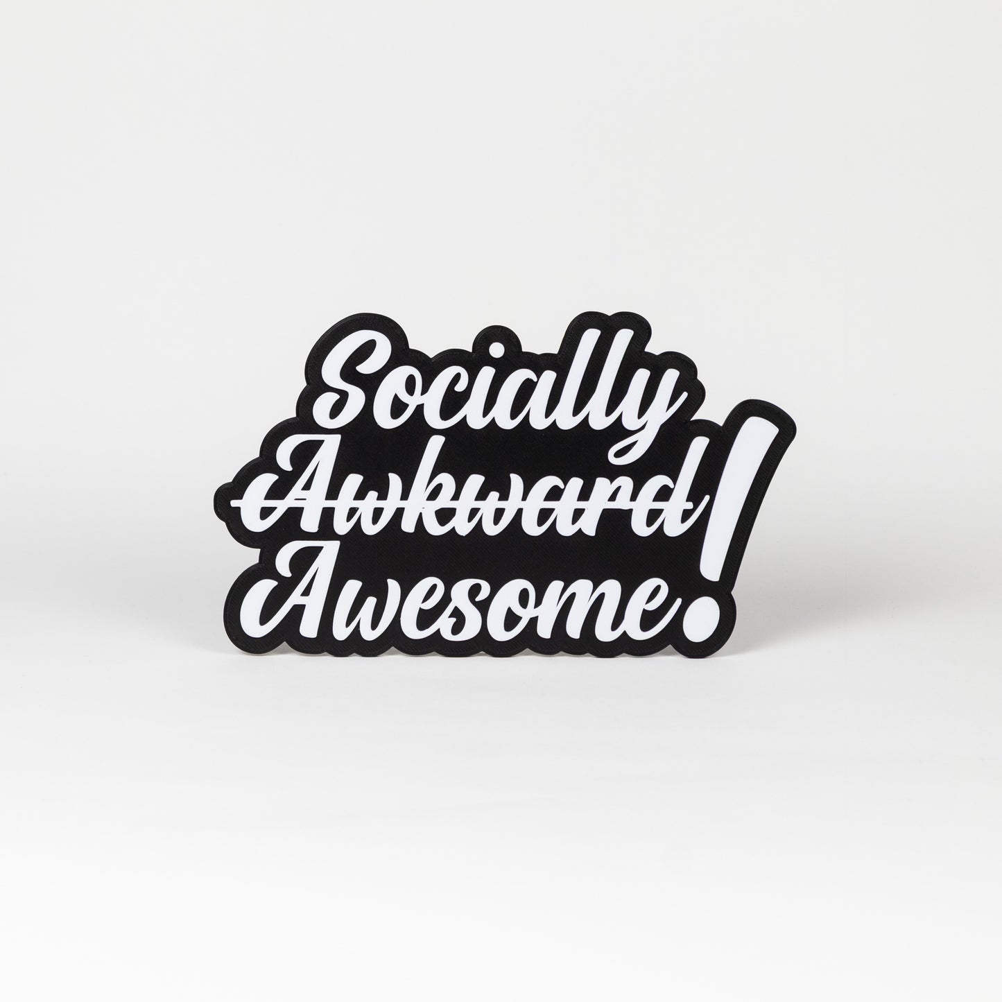 Black and white sign that says, "Socially Awkward Awesome!". Photo booth prop.