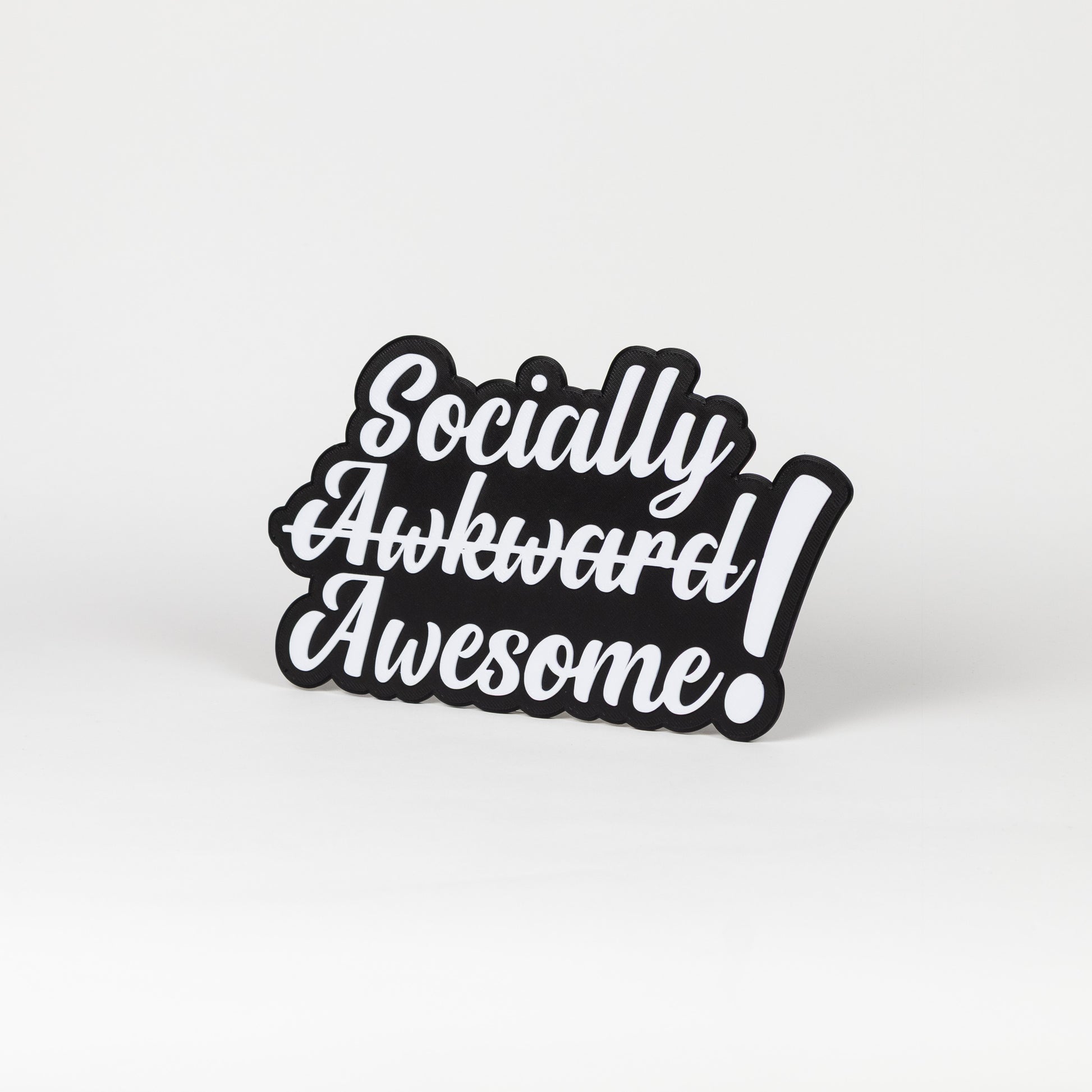 Black and white sign that says, "Socially Awkward Awesome!". Photo booth prop.